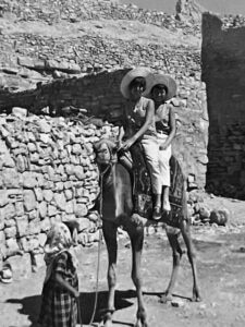Judy and Suzanne on camel in Southern Tunisia