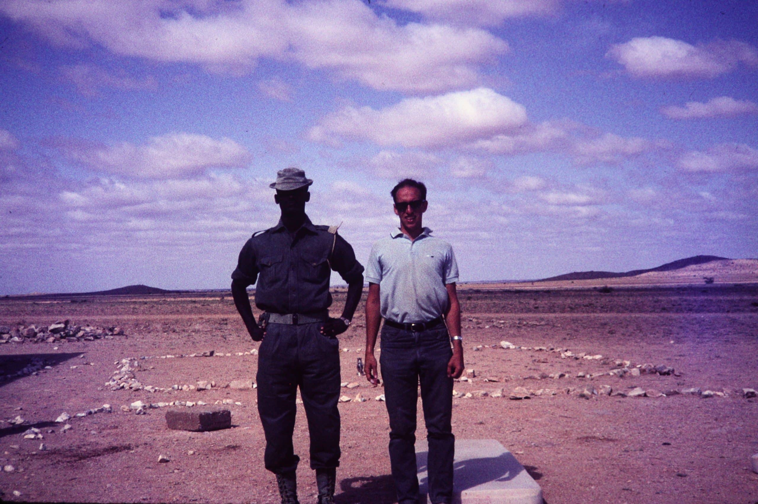 Marty and a Somali policeman at a destroyed fort - 1966