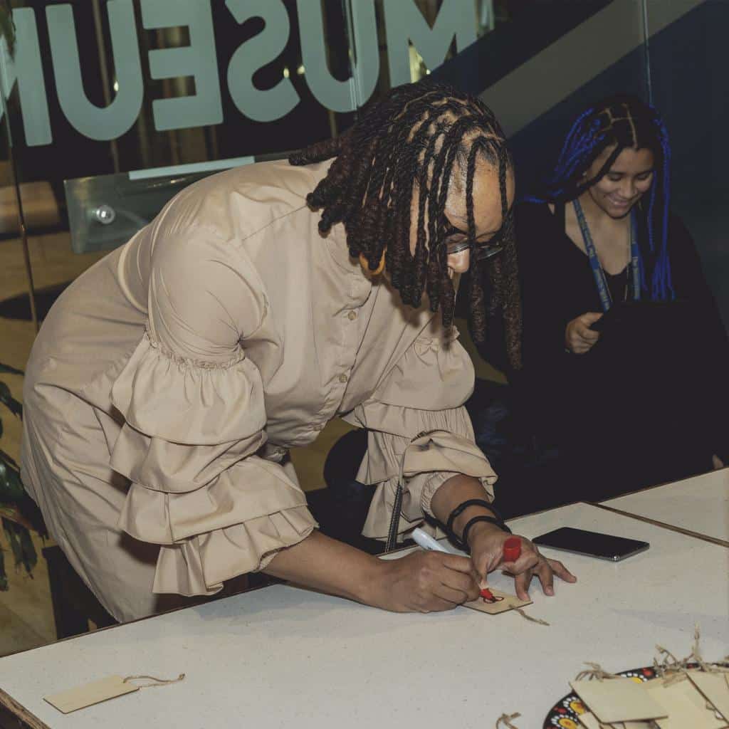 Exhibit opening attendee designs woodblock